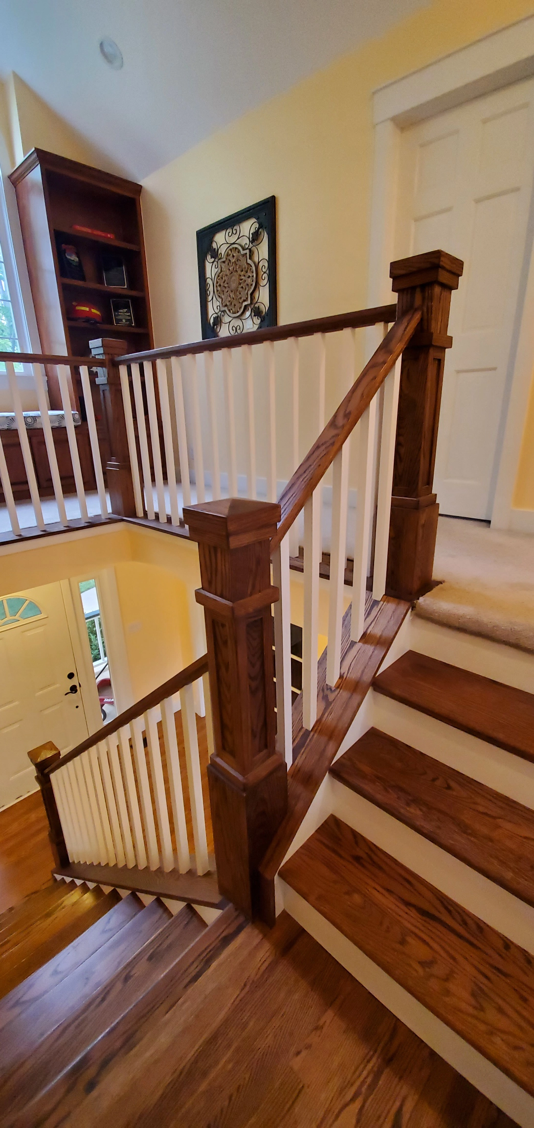 Box newels with painted square balusters in a craftsman style
