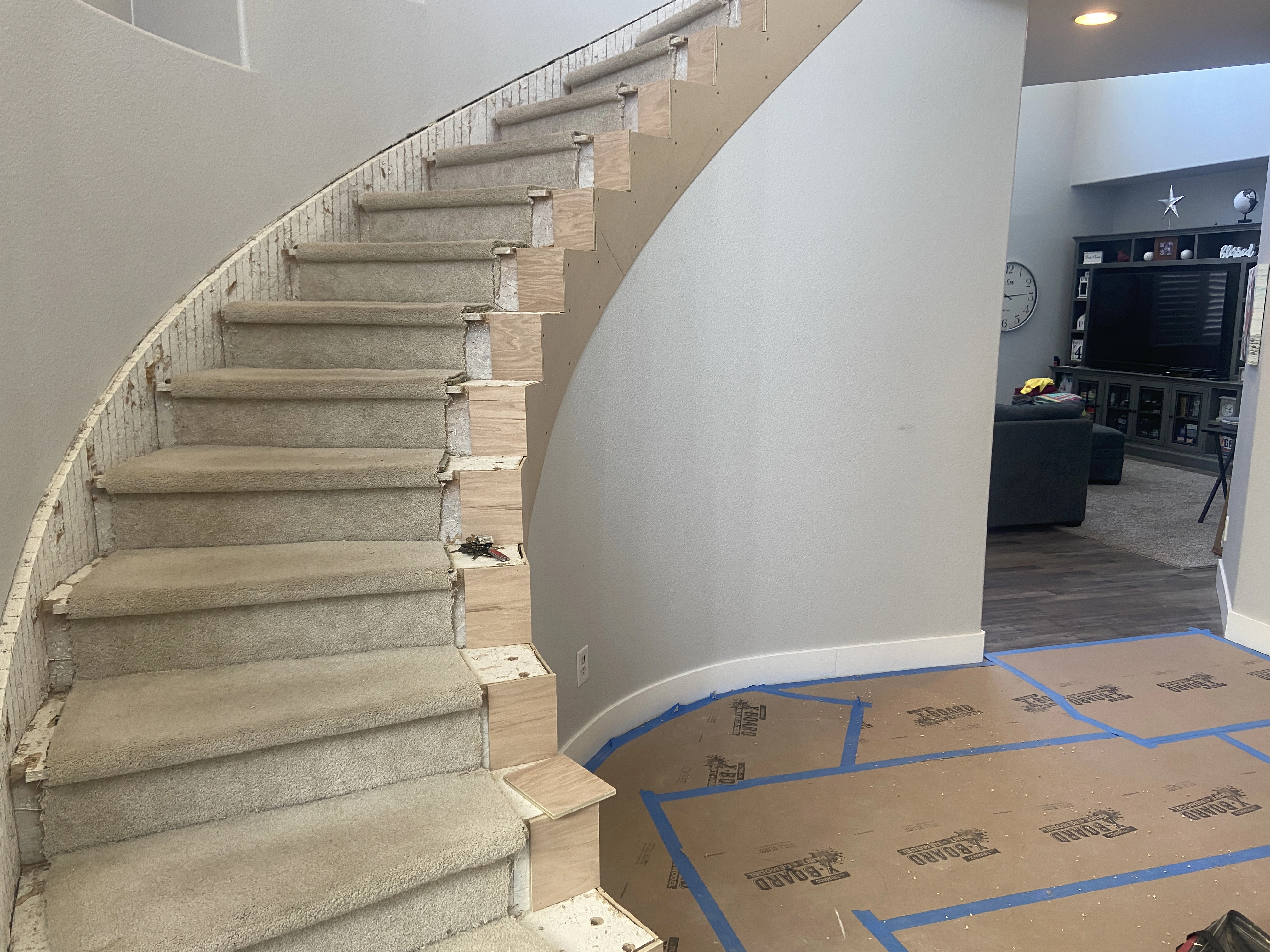 Custom stair finish carpentry with rail fittings and trim details